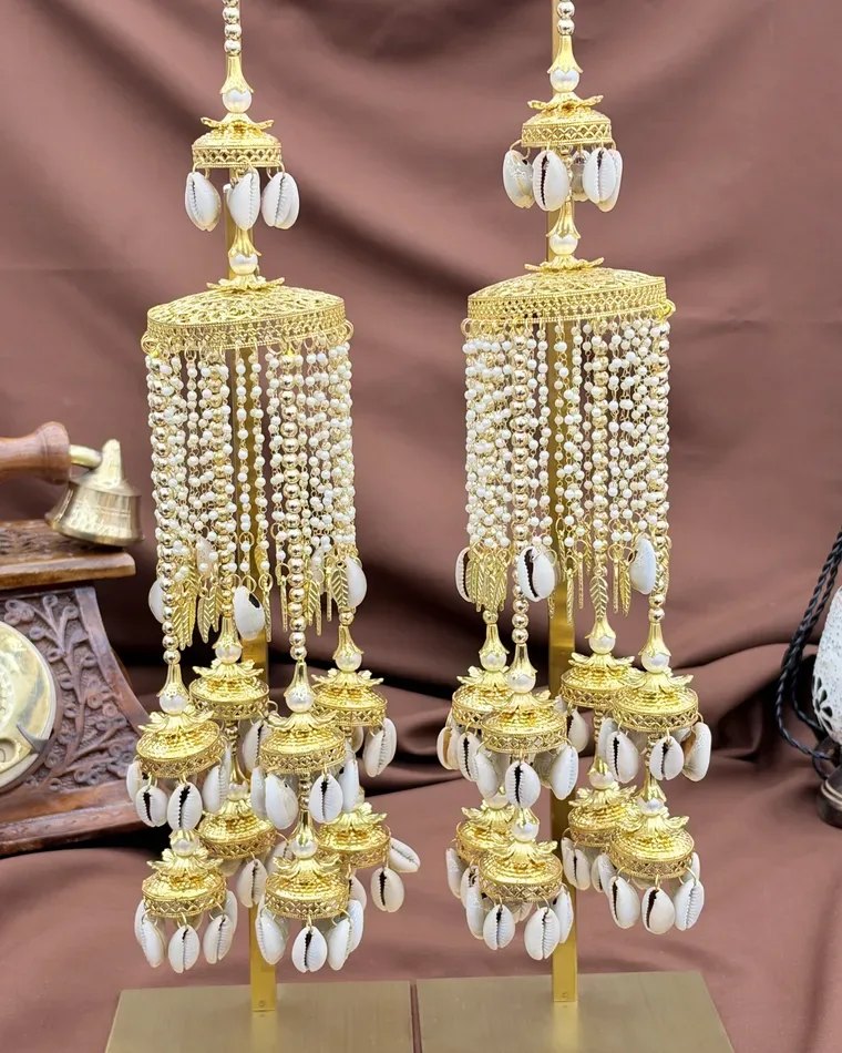 Traditional gold bridal kaleera set with cowrie shells, jhumkis and pearl strands — bridal kalire Calgary