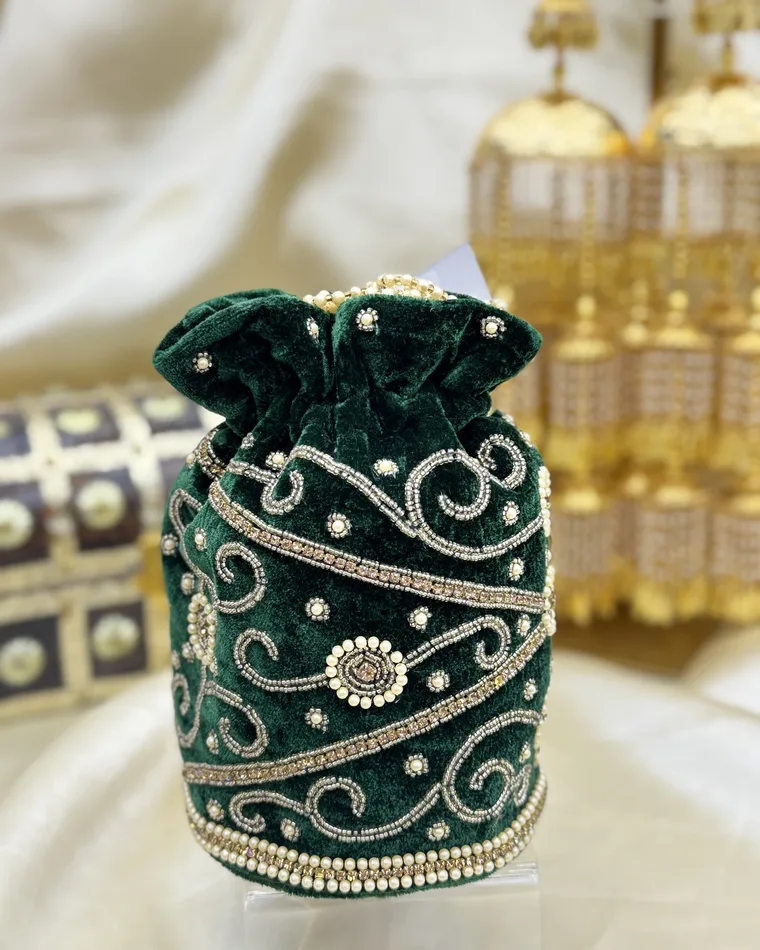 Emerald green velvet potli bag with pearl and gold zardozi swirl embroidery — Indian wedding potli Calgary