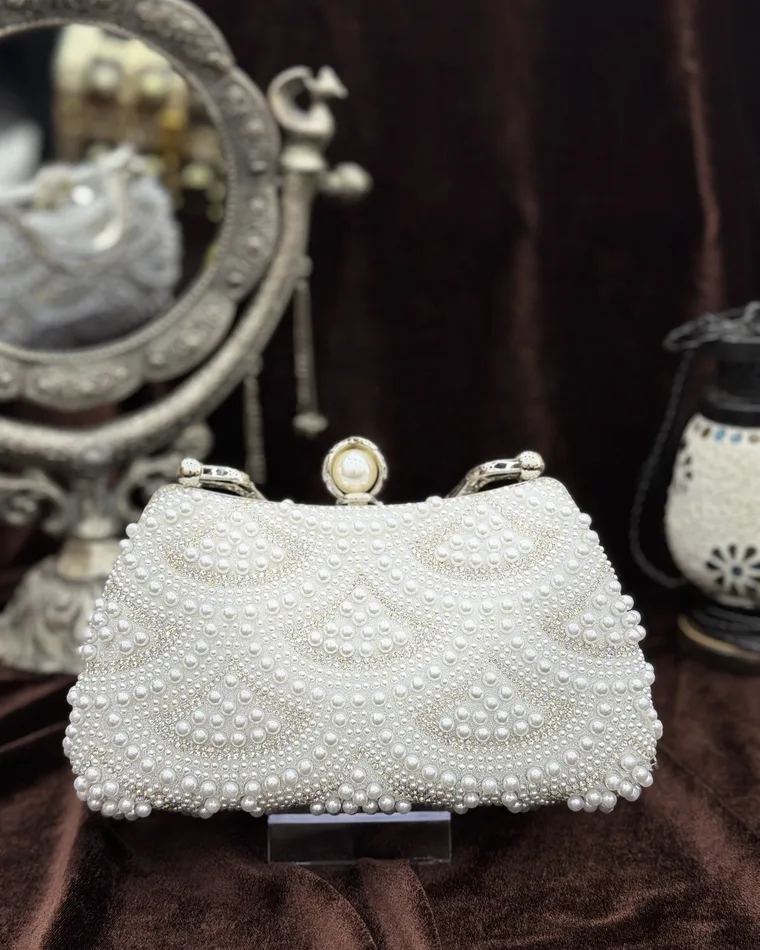 Ivory faux pearl evening clutch with silver frame handle and pearl clasp — bridal party clutch Calgary