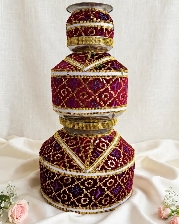 Deep maroon velvet jaggo with ethnic patterns and LED lights for rent in Calgary