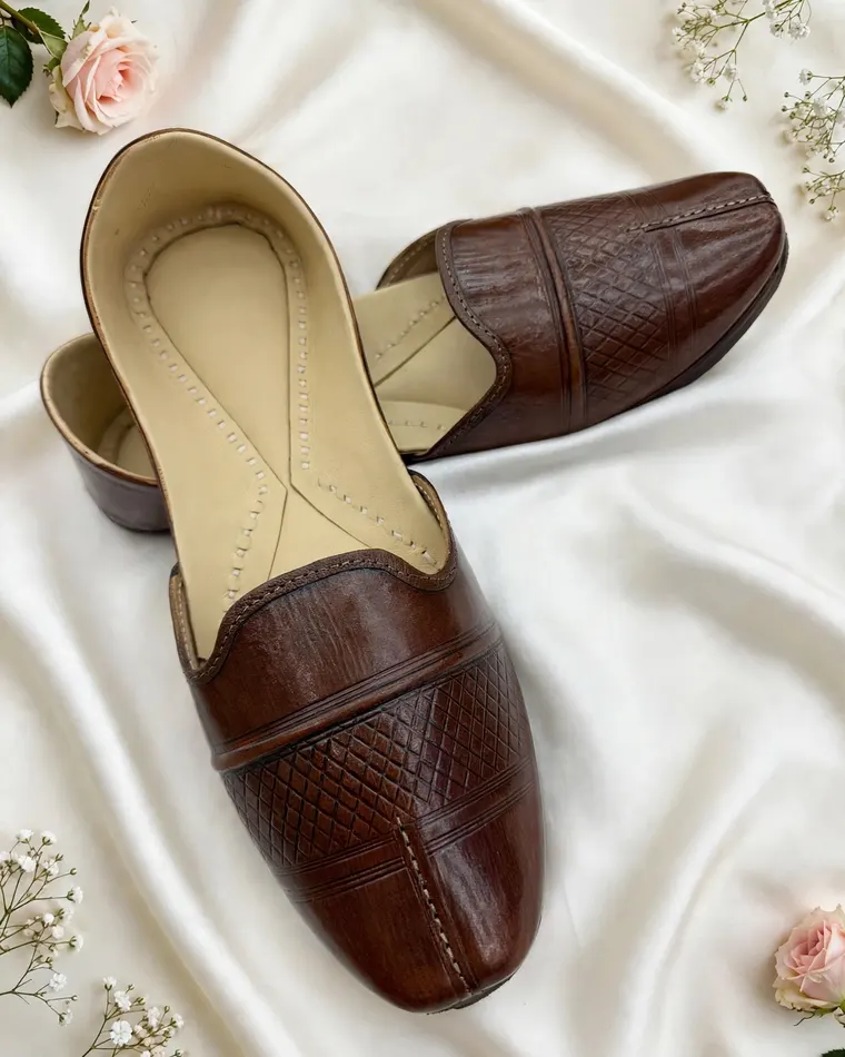 Brown grid textured leather mojri with panel stitching