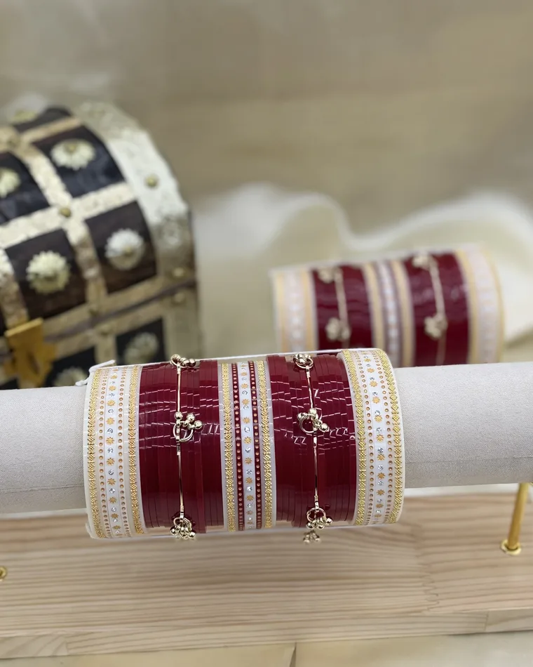 Traditional maroon bridal chooda set with gold printed cream bangles and gold charms, sizes 2.4 to 2.10 — bridal chooda Calgary