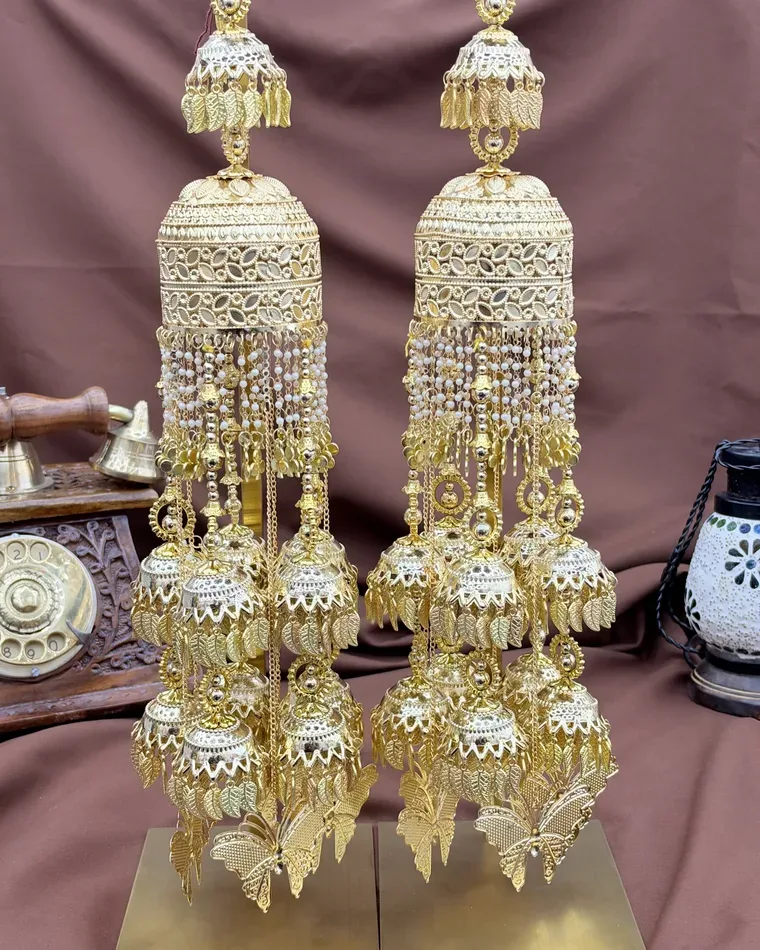 Traditional multi-tier gold bridal kaleera set with filigree details and pearl strands — bridal kalire Calgary