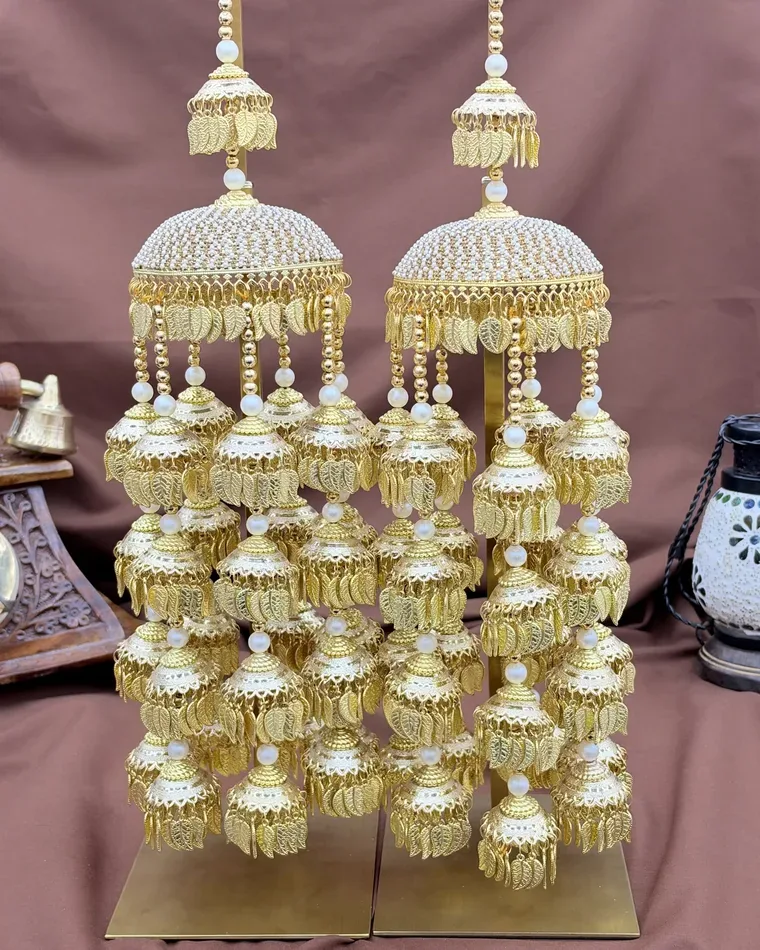 Heavy gold bridal kaleera set with pearl-encrusted dome and cascading leaf jhumkis — bridal kalire Calgary