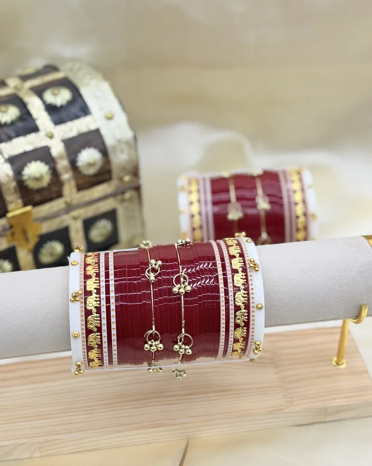 Traditional red bridal chooda set with gold elephant printed ivory bangles and gold charms, sizes 2.2 to 2.10 — bridal chooda Calgary