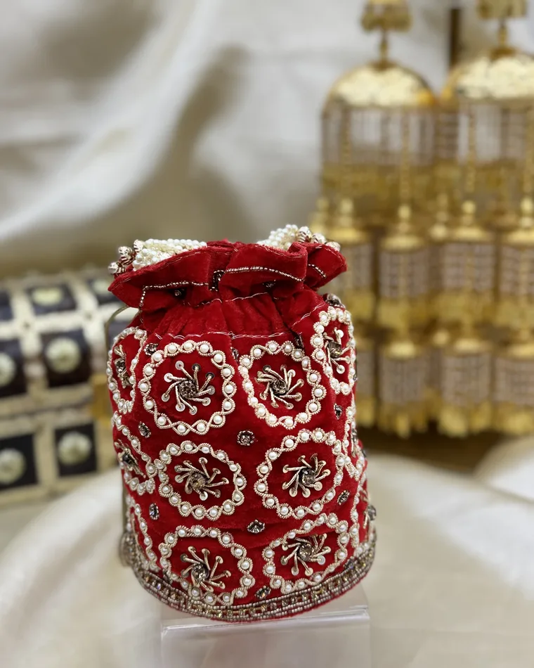 Red velvet embroidered potli bag with pearl bead handle and zardozi work — Indian wedding potli Calgary