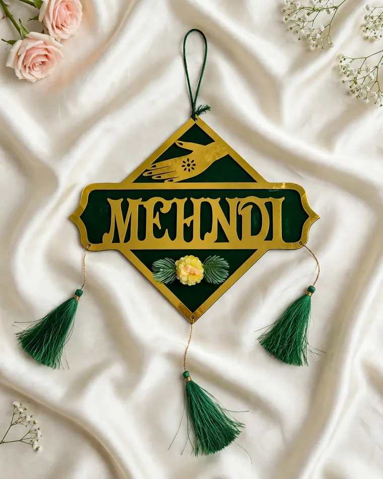 Green and gold Mehndi sign board with henna hand motif and green tassels