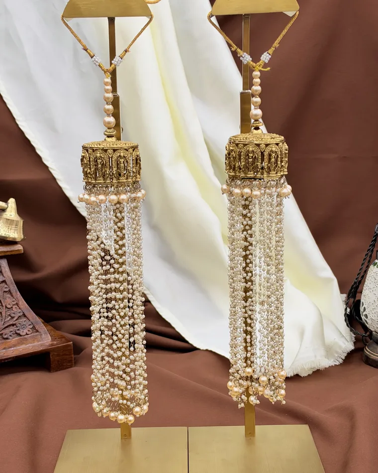 Temple style antique gold bridal kaleere set with divine motifs and cascading pearl strands — bridal kalire Calgary