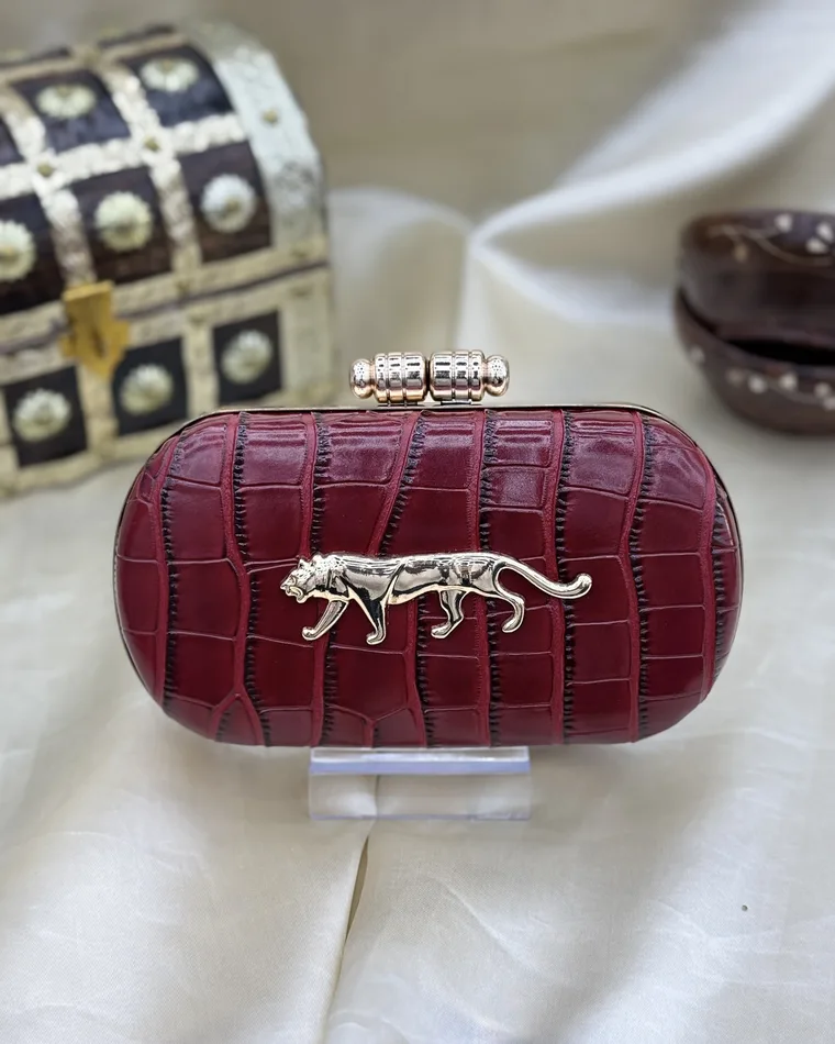 Royal tiger croc-embossed hard-shell clutch in crimson maroon