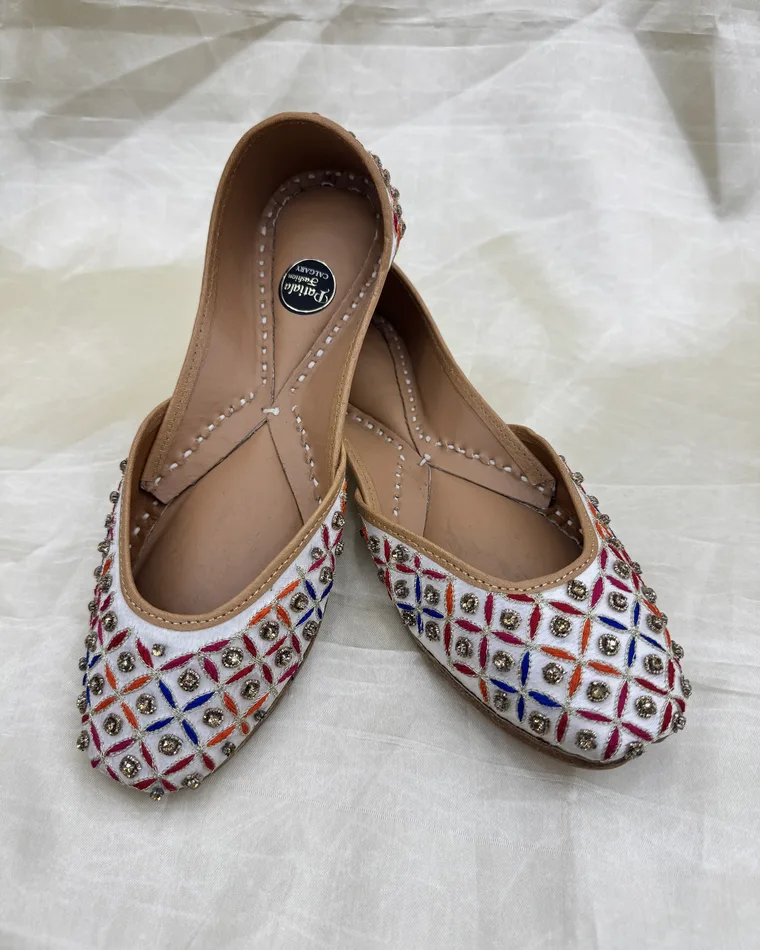White Punjabi jutti with multi-color thread and stone embroidery — women's jutti Calgary